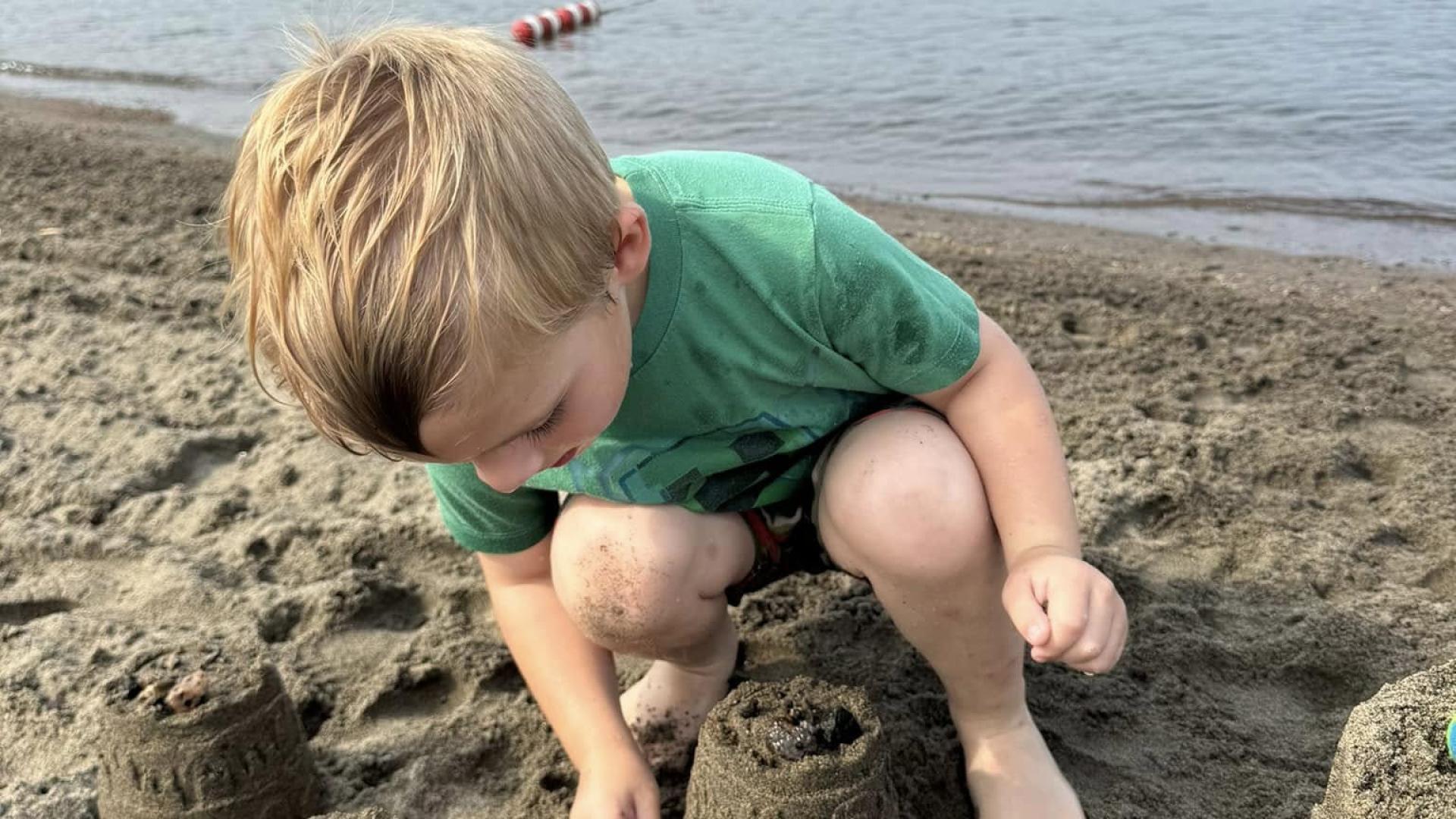 kids splashing in lake