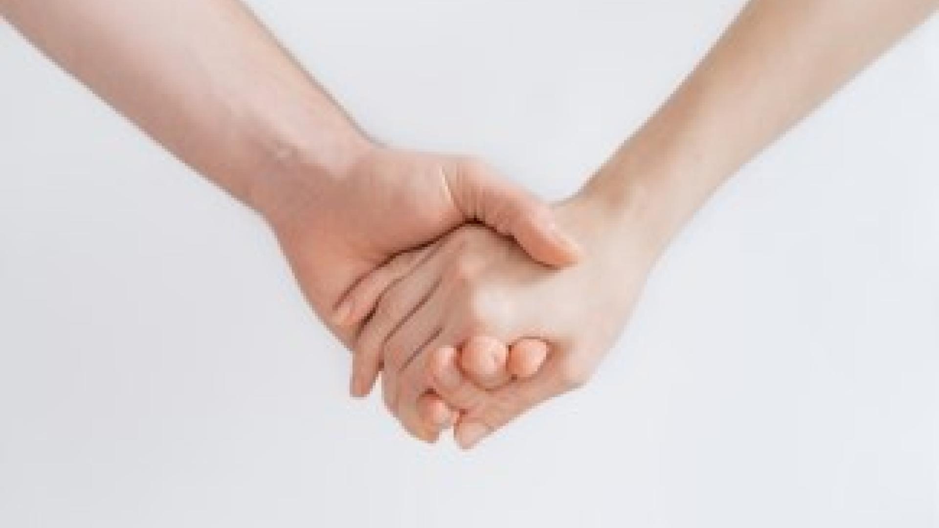 image of holding hands